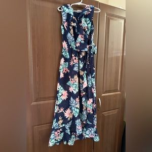 Youth Girls dress size 7. Navy blue with bright flowers, ruffles and side tie.